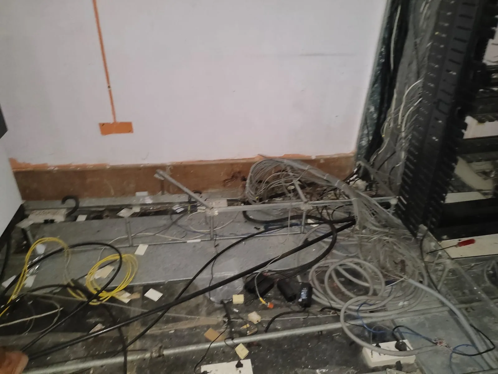 Dismantled multi-pair cables organized neatly during an office shifting services Guindy project.